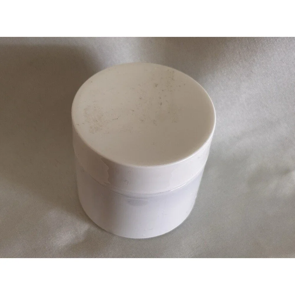 Lot of 6 plastic containers 2 1/16” X 2 1/16”with screw on lids white in color.
